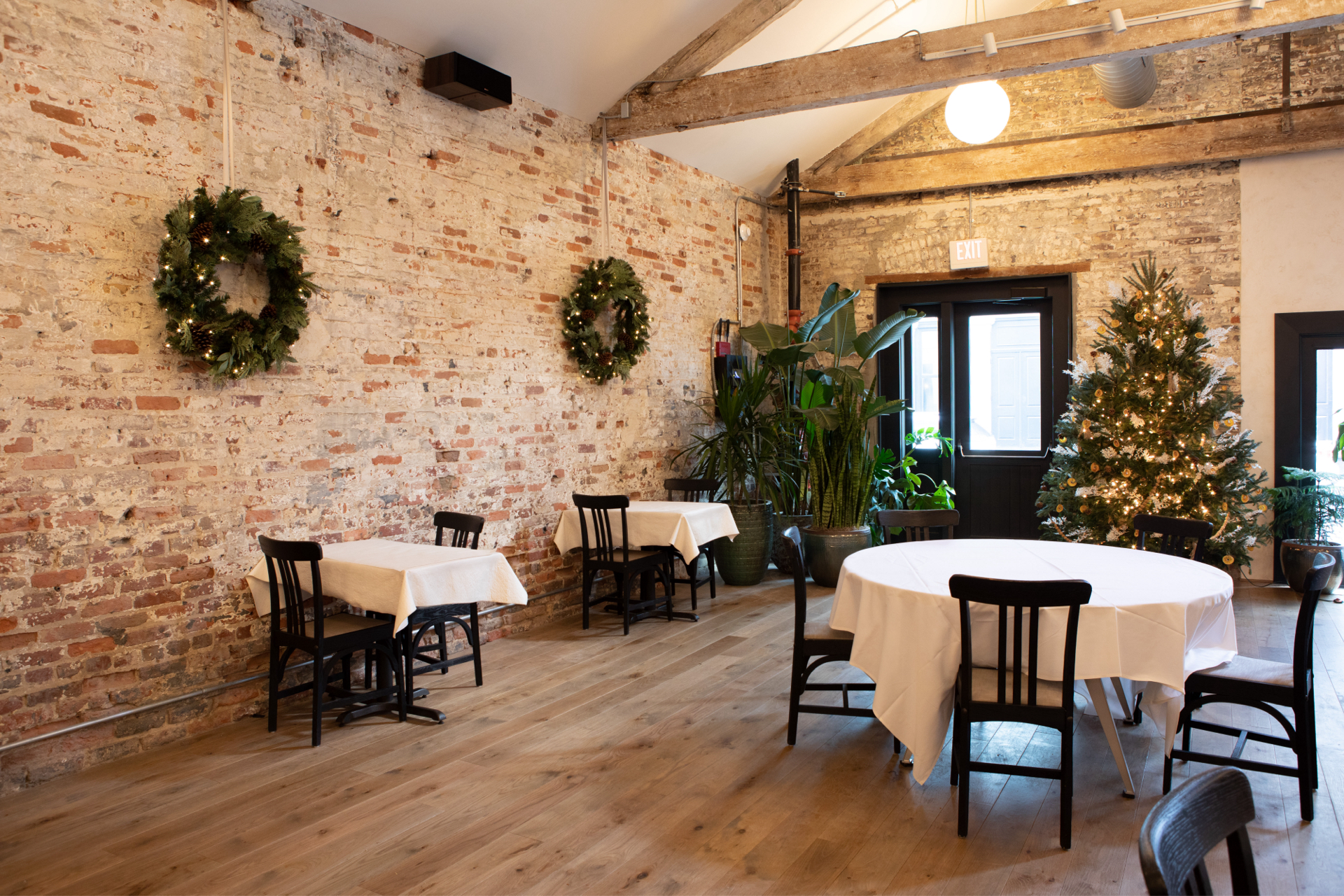 table setup in brick wall restaurant area